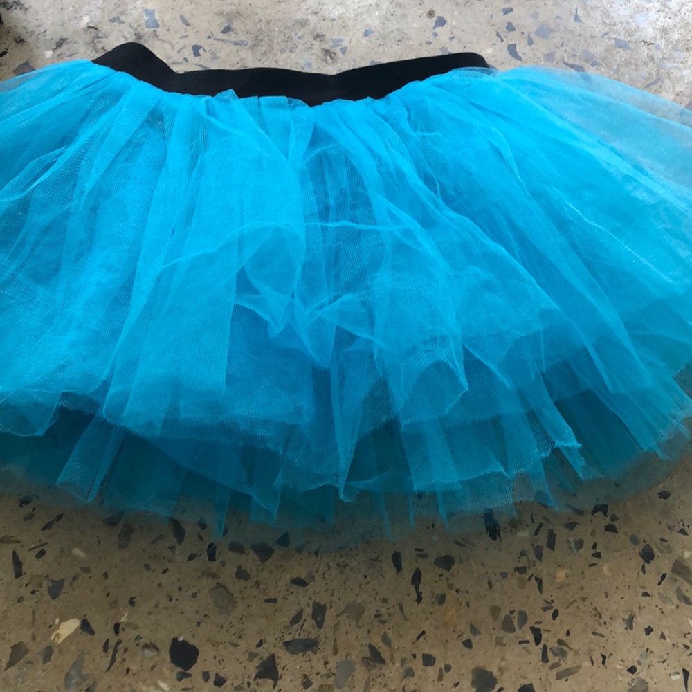 A blue gone for a run running Tutu